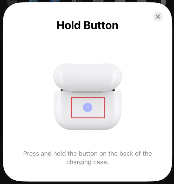 Press and hold the button on the Charging Case